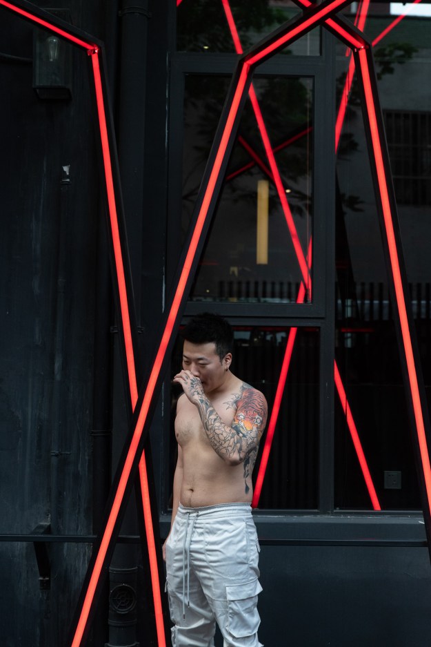 A client waits outside a studio.